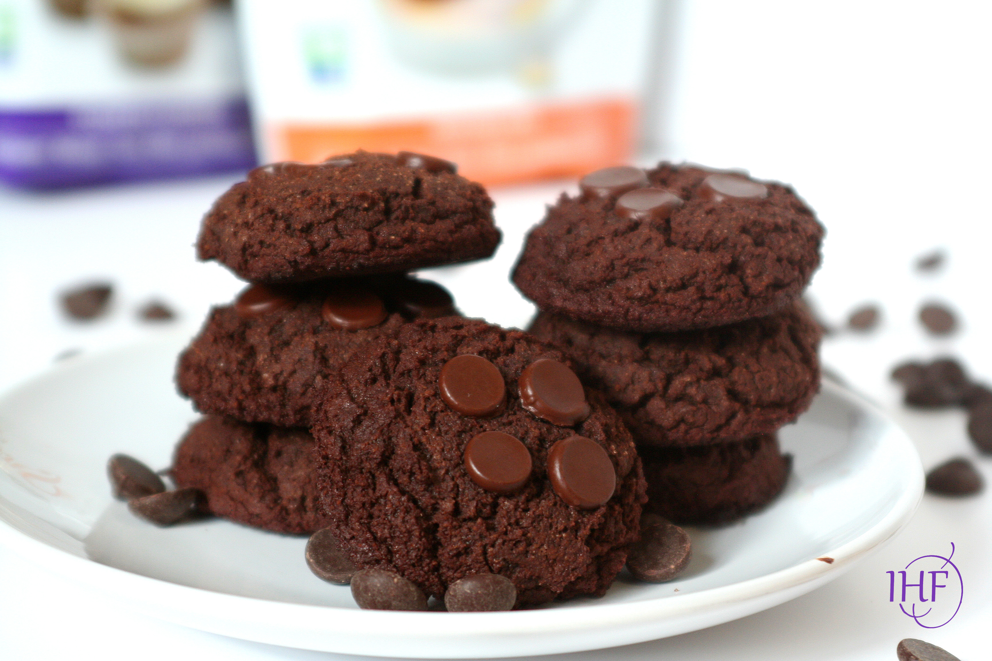 Brownie cookies stacked on a white plate