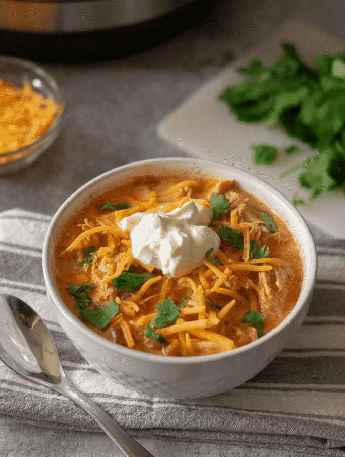  Low Carb Chicken Taco Soup is a quick and easy dish that the entire family will love! It can be prepared in an instant pot or a slow cooker! www.innovativehealthfitness.com