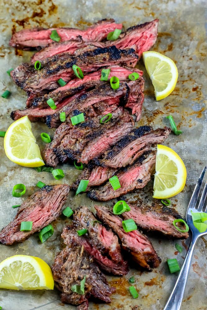 The best garlic grilled flank steak recipe ever for delicious juicy flank steak or skirt steak with a crunchy crust on the grill. Perfect easy recipe for grilled flank steak for steak salad, steak tacos, fajitas, and more!