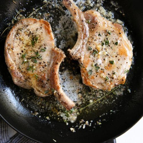  Easy Pork Chop Recipe made with garlic, butter, and fresh thyme. Ready in just 15 minutes, enjoy this crazy delicious and juicy recipe with all your favorite side dish recipes for a fast and flavorful dinner the whole family will love.