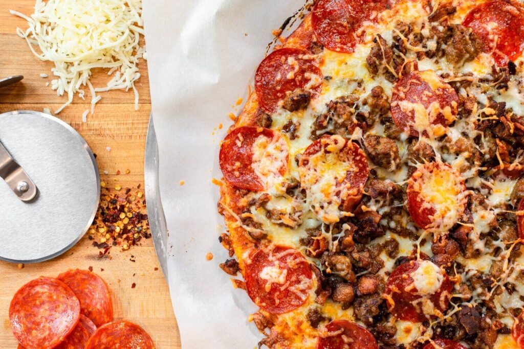 Zero Carb Crust Meat Lovers Pizza  Have you made a ZERO carb pizza crust before?! You will LOVE this simple and yummy recipe! It’s kid-friendly too! Add some low sugar marinara sauce and your favorite toppings and you’re good to go!