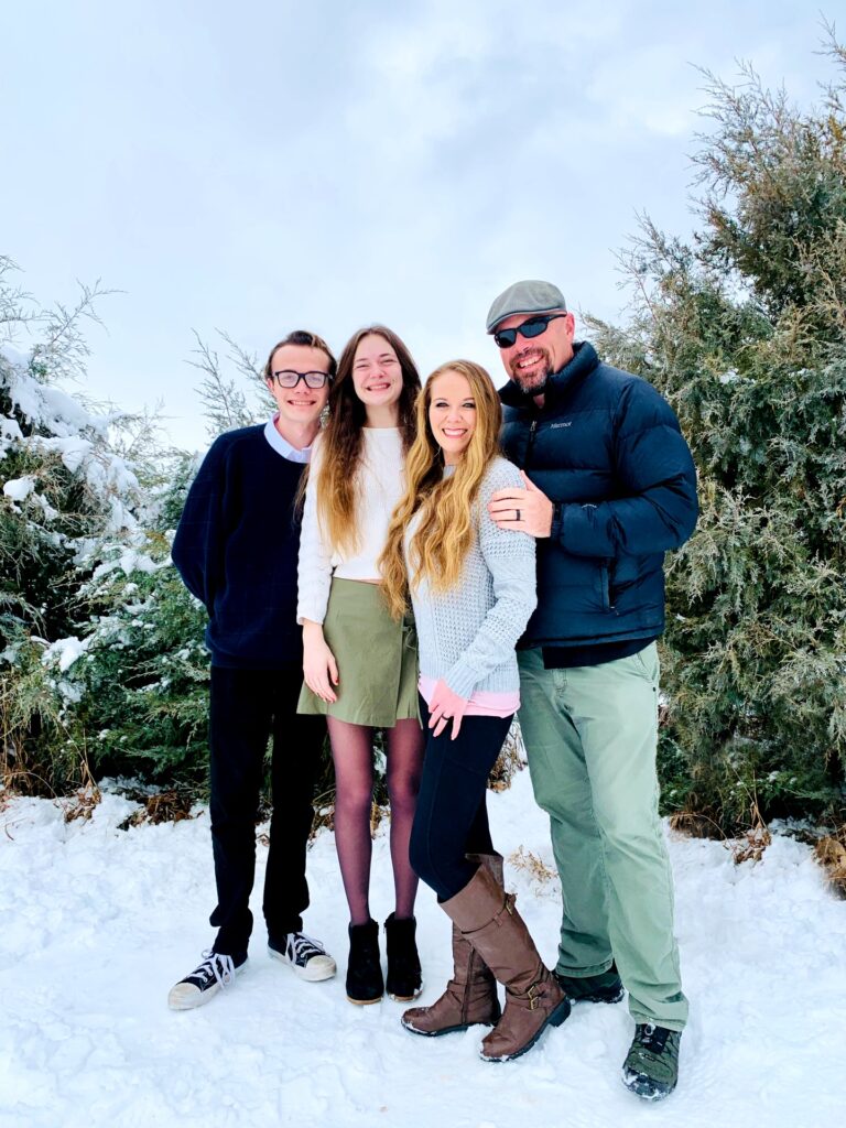 The McConnell Family outside in the snow mom, dad, son and daughter. 
Hi I'm Kristin creator of Live Simply with Kristin! www.livesimplywithkristin.com