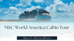 Interior photo of a modern MSC World America balcony cruise cabin featuring a large bed, seating area, and glass doors leading to an ocean view balcony.